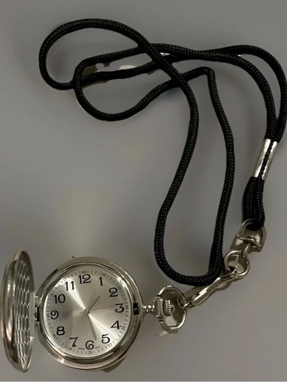 Silver-tone Pocket Watch Pendant with Train Illustration